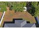 Aerial view of backyard, showing shed and partially visible home at 6069 Newmark St, Spring Hill, FL 34606