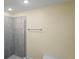 Shower with glass enclosure in main bathroom at 6069 Newmark St, Spring Hill, FL 34606