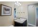 Small bathroom with single sink vanity, granite countertop, and bathtub at 6069 Newmark St, Spring Hill, FL 34606