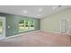 Spacious living room with high ceilings and backyard view at 6069 Newmark St, Spring Hill, FL 34606