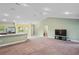 Open living room with kitchen and dining area views at 6069 Newmark St, Spring Hill, FL 34606
