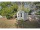 Well-maintained storage shed nestled in the backyard at 6069 Newmark St, Spring Hill, FL 34606