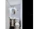 Clean and modern bathroom with pedestal sink and toilet at 6811 S Himes Ave, Tampa, FL 33611