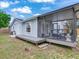 House exterior with a deck and screened porch at 6811 S Himes Ave, Tampa, FL 33611