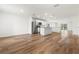 Open kitchen with stainless steel appliances and an island at 7220 Swartburg Rd, North Port, FL 34291