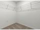 Spacious walk-in closet with wire shelving at 7220 Swartburg Rd, North Port, FL 34291