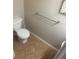Small bathroom with toilet, flooring and a vanity at 8431 Edgewater Place Blvd, Tampa, FL 33615