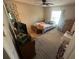 Bedroom with a queen bed, dresser and window at 8431 Edgewater Place Blvd, Tampa, FL 33615