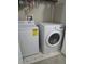 Bright laundry room, featuring a washer and dryer at 8431 Edgewater Place Blvd, Tampa, FL 33615