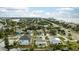 Aerial view of residential neighborhood near the coast at 105 3Rd St, Belleair Beach, FL 33786