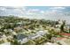 Aerial showing houses and streets in a coastal neighborhood at 105 3Rd St, Belleair Beach, FL 33786