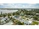 Aerial view of waterfront homes and neighborhood at 105 3Rd St, Belleair Beach, FL 33786