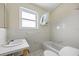 Bathroom with bathtub and shower at 105 3Rd St, Belleair Beach, FL 33786