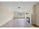 Living room with fireplace and new floors at 105 3Rd St, Belleair Beach, FL 33786