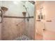 Bathroom with walk-in shower and grab bars at 1207 Eastloch Ct, Sun City Center, FL 33573