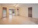 Bedroom with sliding doors to a screened porch at 1207 Eastloch Ct, Sun City Center, FL 33573