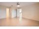 Spacious bedroom with tile floors and a ceiling fan at 1207 Eastloch Ct, Sun City Center, FL 33573