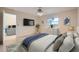 Bedroom with bed and view into another room at 1207 Eastloch Ct, Sun City Center, FL 33573