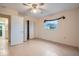 Bedroom with tile floors and a large closet at 1207 Eastloch Ct, Sun City Center, FL 33573