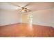 Spacious living room featuring light wood flooring at 1207 Eastloch Ct, Sun City Center, FL 33573