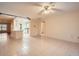 Living area with view into kitchen and bathroom at 1207 Eastloch Ct, Sun City Center, FL 33573