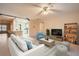 Living room boasts stylish furniture and decor at 1207 Eastloch Ct, Sun City Center, FL 33573