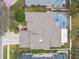 Aerial view showing home's layout, pool, and landscaping at 15005 Lake Emerald Blvd, Tampa, FL 33618