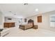 Spacious bedroom with built-in cabinets and a wet bar at 15005 Lake Emerald Blvd, Tampa, FL 33618