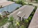 Aerial view of single-Gathering home with landscaped yard at 1531 Riverdale Dr, Oldsmar, FL 34677