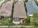 Overhead view of the property, highlighting the house and landscaped backyard at 1531 Riverdale Dr, Oldsmar, FL 34677
