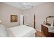 Comfortable bedroom with hardwood floors and antique furniture at 1531 Riverdale Dr, Oldsmar, FL 34677