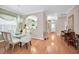 Elegant dining room with hardwood floors and a crystal chandelier at 1531 Riverdale Dr, Oldsmar, FL 34677