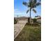 One-story house with a two-car garage and a brick paved driveway at 1531 Riverdale Dr, Oldsmar, FL 34677