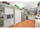 Kitchen features granite countertops, stainless steel appliances, and custom cabinetry at 1531 Riverdale Dr, Oldsmar, FL 34677