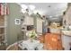 Kitchen boasts stainless steel appliances, granite countertops and breakfast nook at 1531 Riverdale Dr, Oldsmar, FL 34677