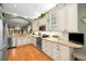 Spacious kitchen featuring granite countertops and stainless steel appliances at 1531 Riverdale Dr, Oldsmar, FL 34677