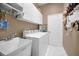 Laundry room with washer, dryer, and utility sink at 1531 Riverdale Dr, Oldsmar, FL 34677