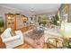 Open concept living area with hardwood floors and ample natural light at 1531 Riverdale Dr, Oldsmar, FL 34677