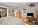 Main bedroom with a view of the living room and backyard at 1531 Riverdale Dr, Oldsmar, FL 34677