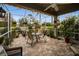 Relaxing screened patio with seating area and lush landscaping at 1531 Riverdale Dr, Oldsmar, FL 34677