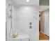 Large walk-in shower with marble tile and built-in seat at 1531 Riverdale Dr, Oldsmar, FL 34677