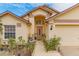 Attractive single-story home with a two-car garage and well-manicured landscaping at 1706 Kirtley Dr, Brandon, FL 33511