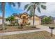 Single-story house with a two-car garage and lush landscaping at 1706 Kirtley Dr, Brandon, FL 33511