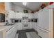 Bright kitchen features white cabinets and modern appliances at 1706 Kirtley Dr, Brandon, FL 33511