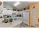 Kitchen with white cabinets and appliances at 1706 Kirtley Dr, Brandon, FL 33511