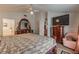 Large main bedroom with king bed, dresser, and sitting area at 1706 Kirtley Dr, Brandon, FL 33511