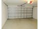 Garage with automatic opener and door to house at 18916 New Passage Blvd, Land O Lakes, FL 34638