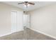 Spacious bedroom with double door closet and polished concrete floors at 2166 Temple Ter, Clearwater, FL 33764