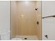 Modern bathroom with a walk-in shower and neutral colors at 2549 Martha Ln, Land O Lakes, FL 34639