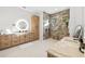 Bathroom with walk-in shower, double vanity, and light wood cabinets at 2549 Martha Ln, Land O Lakes, FL 34639